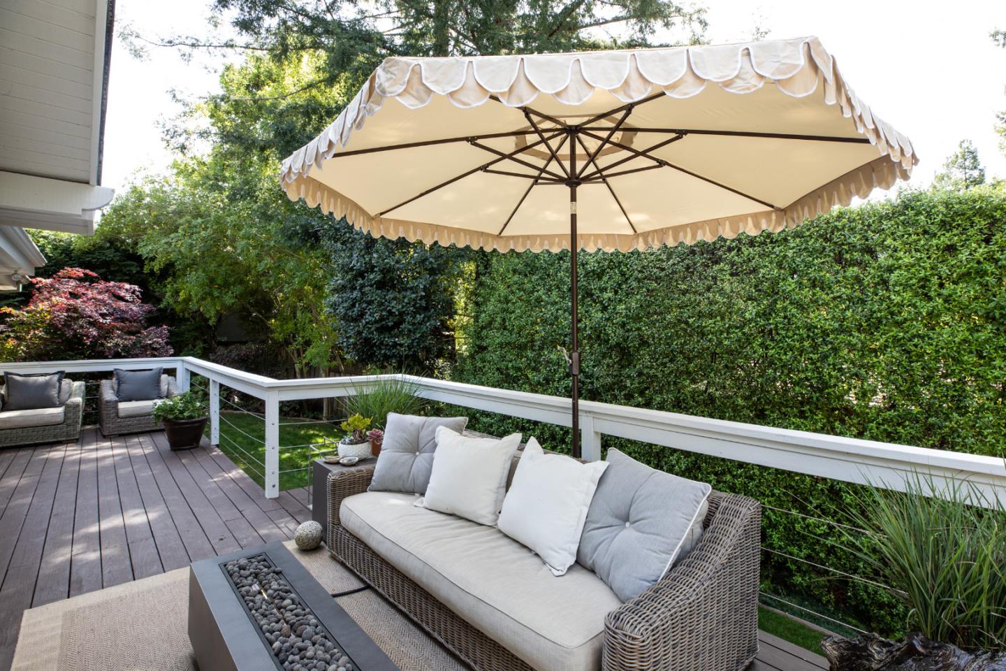 63 Ridge Court Woodside, CA 94062 - Photo 19 of 31 a view of balcony with furniture and umbrella