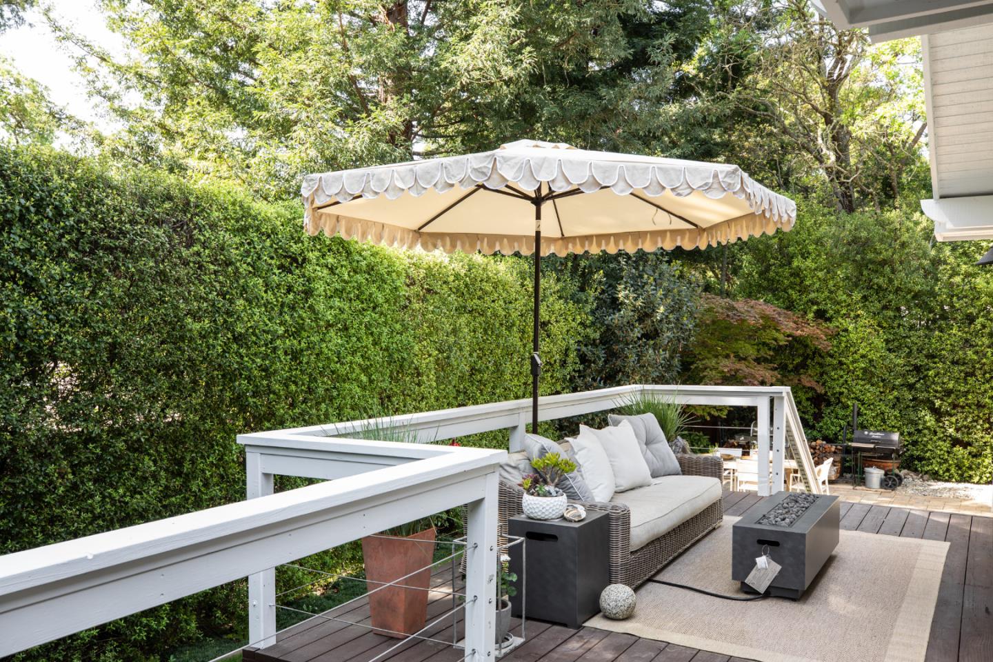 63 Ridge Court Woodside, CA 94062 - Photo 21 of 31 a patio with a yard table and chairs