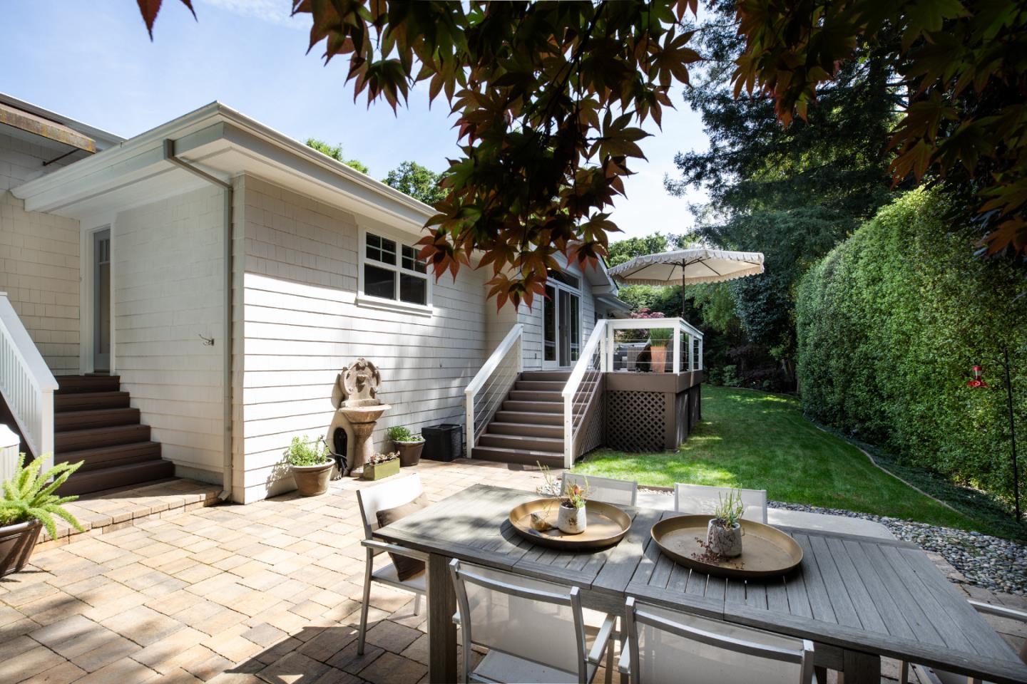 63 Ridge Court Woodside, CA 94062 - Photo 24 of 31 a backyard of a house with seating space