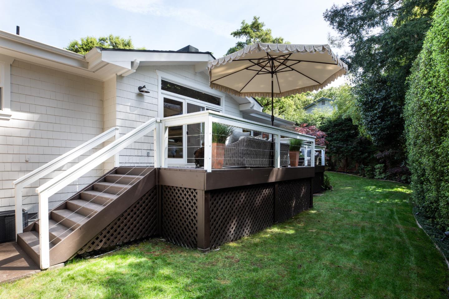63 Ridge Court Woodside, CA 94062 - Photo 26 of 31 a view of a house with a balcony