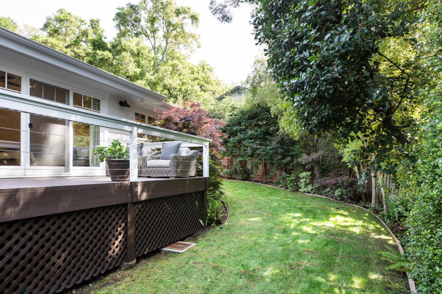 63 Ridge Court Woodside, CA 94062 - Photo 27 of 31 a view of house with a yard and deck