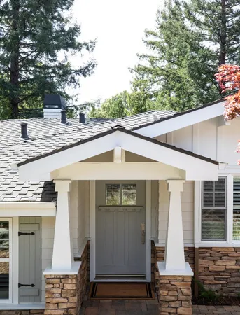 a front view of a house with garage