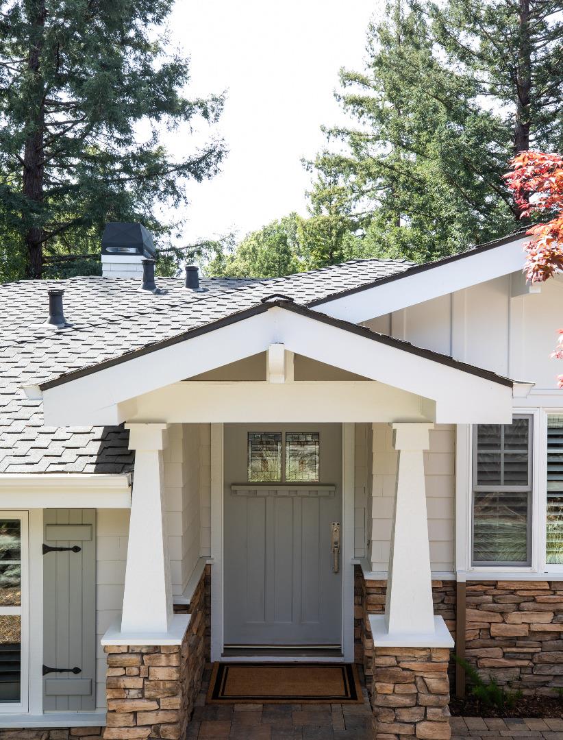 63 Ridge Court Woodside, CA 94062 - Photo 3 of 31 a front view of a house with garage