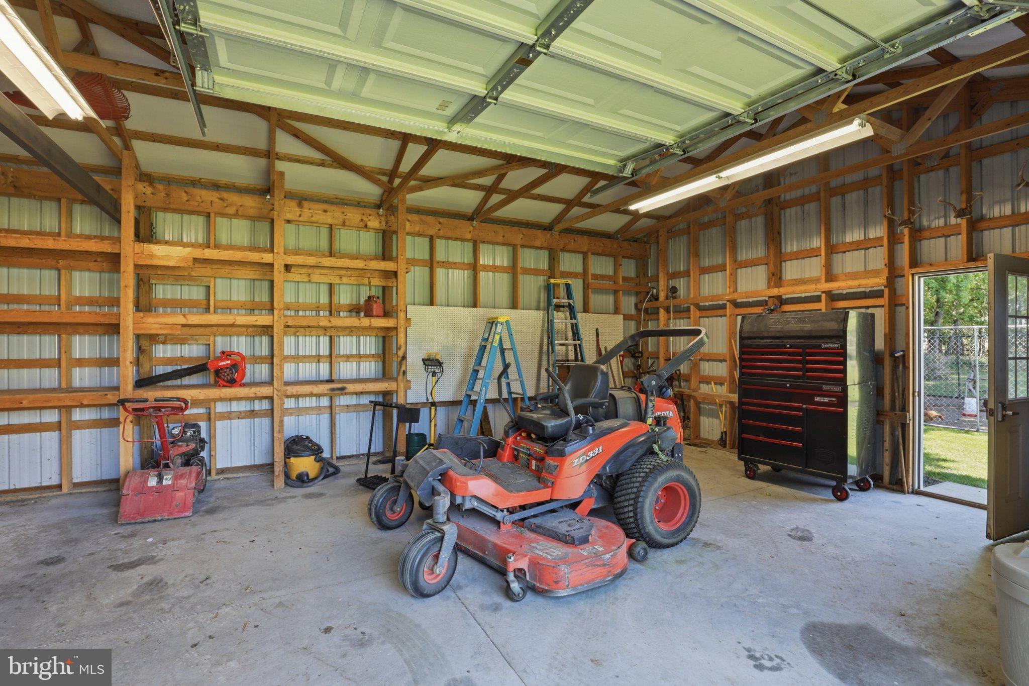 16932 Fitzgeralds Road Lincoln, DE 19960 - Photo 15 of 103 Spacious garage with tools and equipment.