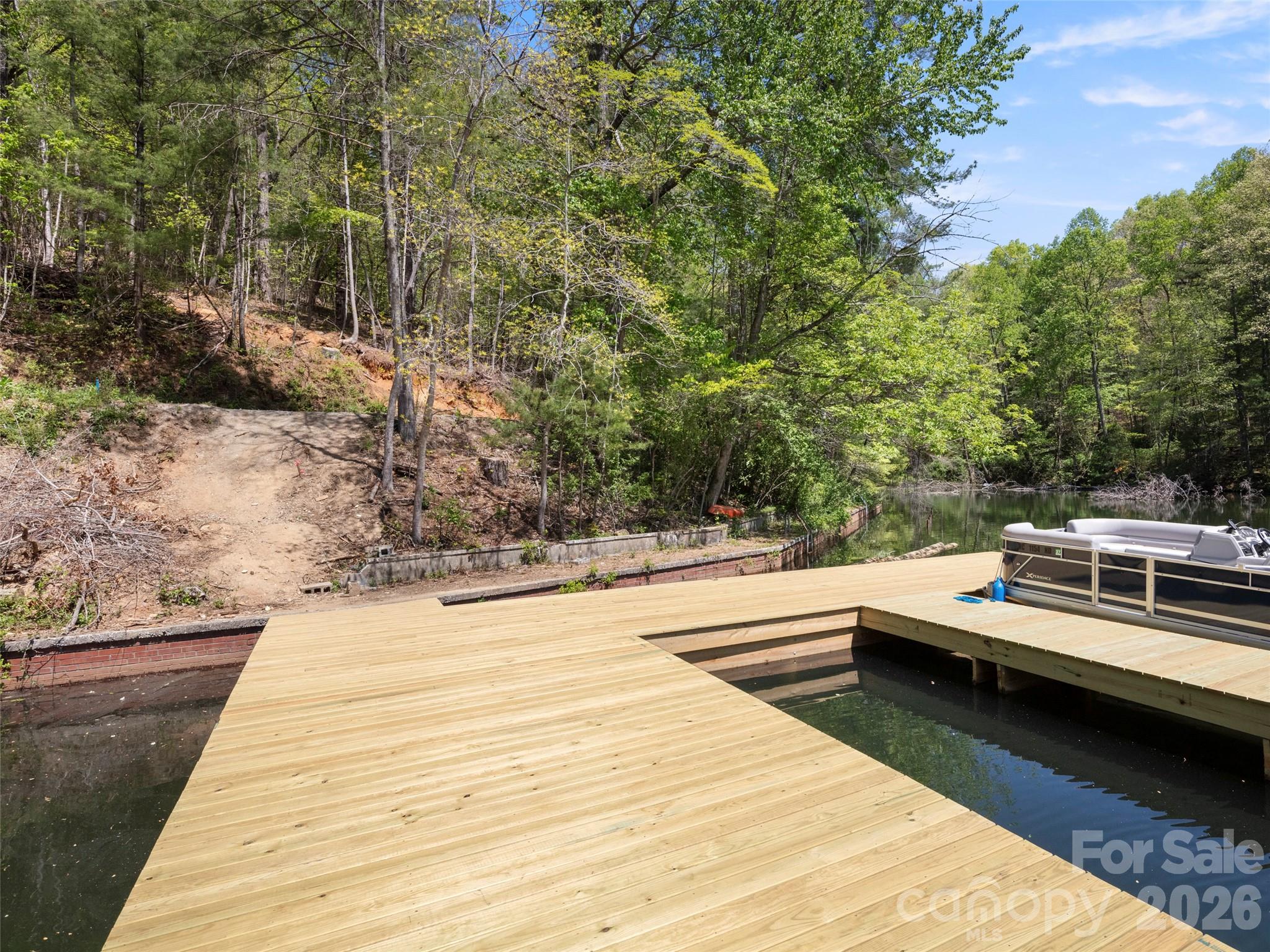 99999 North Lake Summit Road Zirconia, NC 28790 - Photo 6 of 18 a view of a swimming pool with a patio