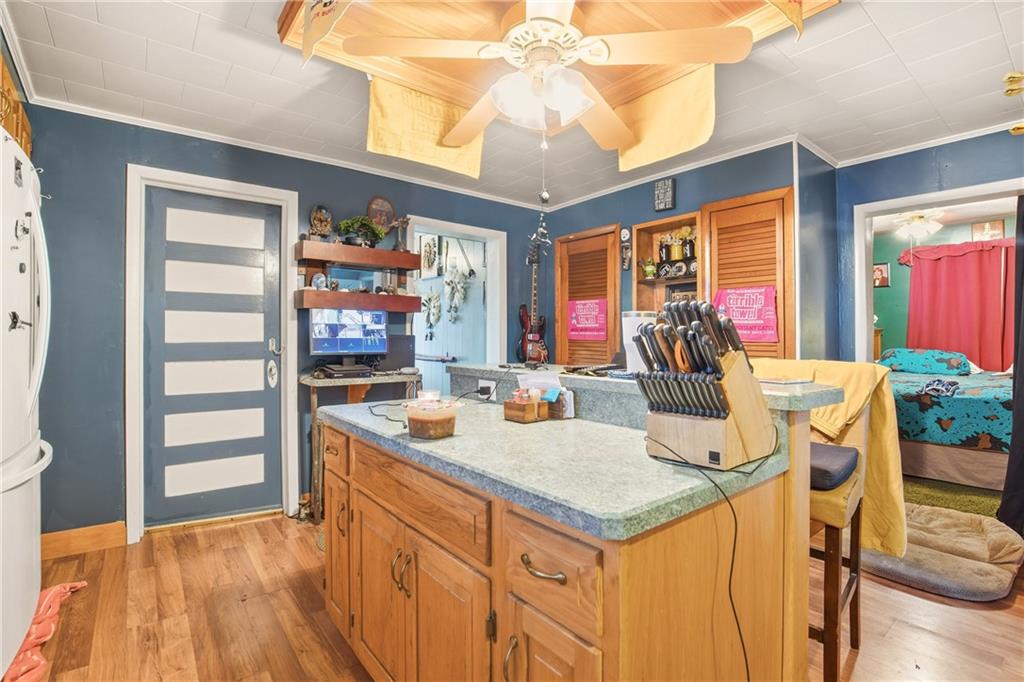 1008 Main Street Berlin, PA 15530 - Photo 16 of 38 a view of a kitchen area with furniture and wooden floor