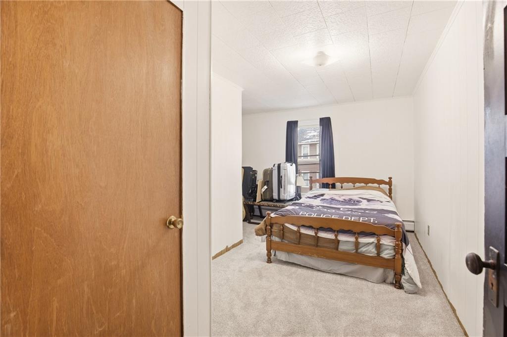 1008 Main Street Berlin, PA 15530 - Photo 20 of 38 a room with a bed and a table