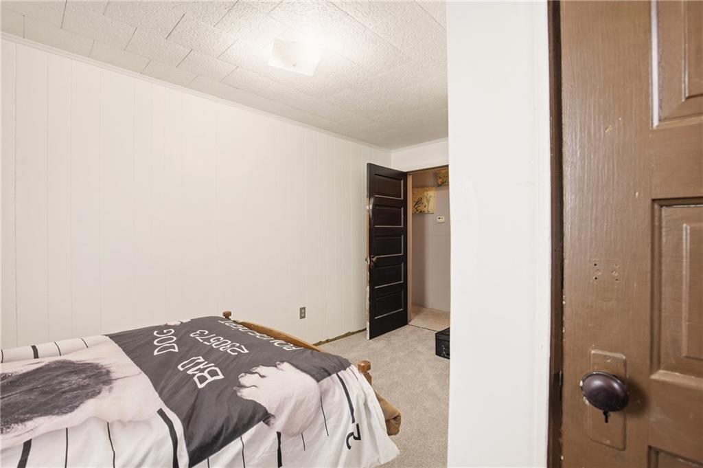 1008 Main Street Berlin, PA 15530 - Photo 21 of 38 a bedroom with a bed and cabinets