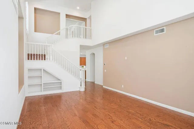 a view of entryway with wooden floor