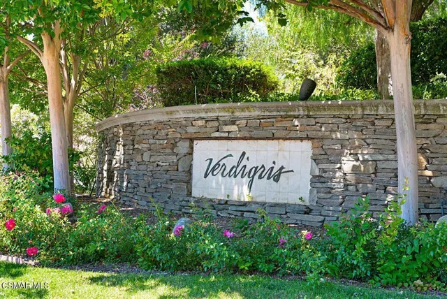 a sign on the side of the road