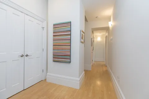 a view of a bathroom from the hallway