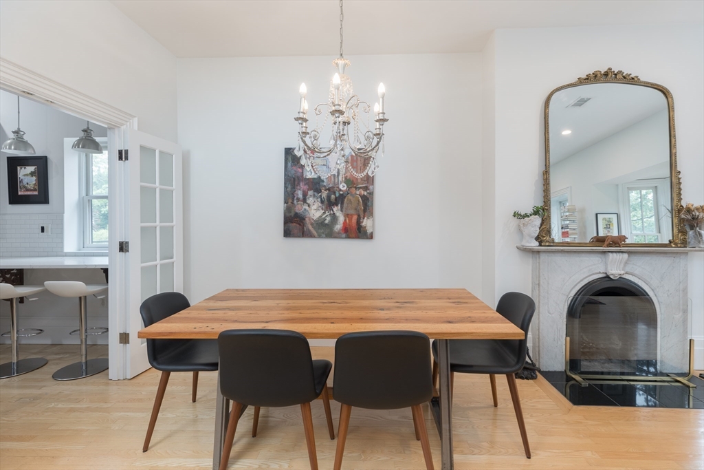 41 Worcester Street, Unit 2 Boston, MA 02118 - Photo 9 of 27 a view of a dining room with furniture and chandelier