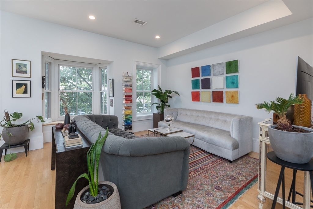 41 Worcester Street, Unit 2 Boston, MA 02118 - Photo 10 of 27 a living room with furniture and a large window