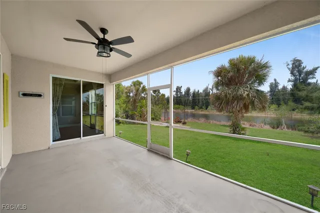 a view of a deck with a big yard