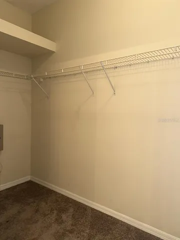 a bathroom with a granite countertop sink mirror and double