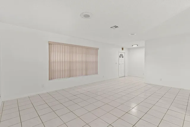 a view of an empty room with window