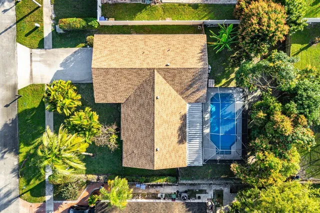 a picture of a brick building with a yard