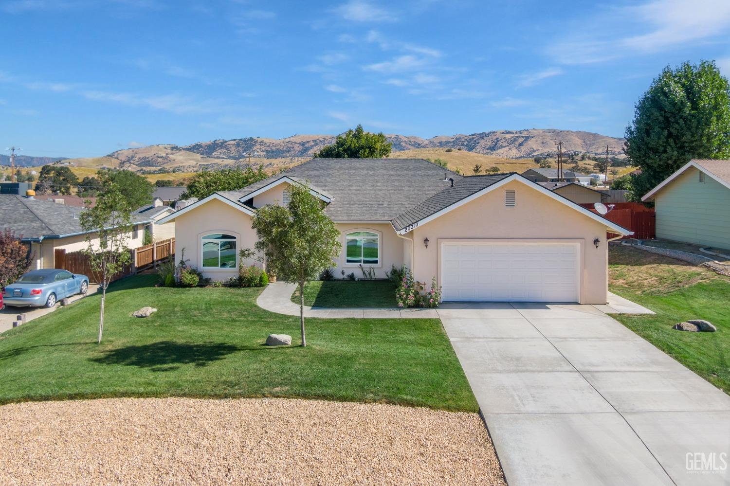 Undisclosed Address Tehachapi, CA 93561 - Photo 1 of 41 a view of a house with a yard