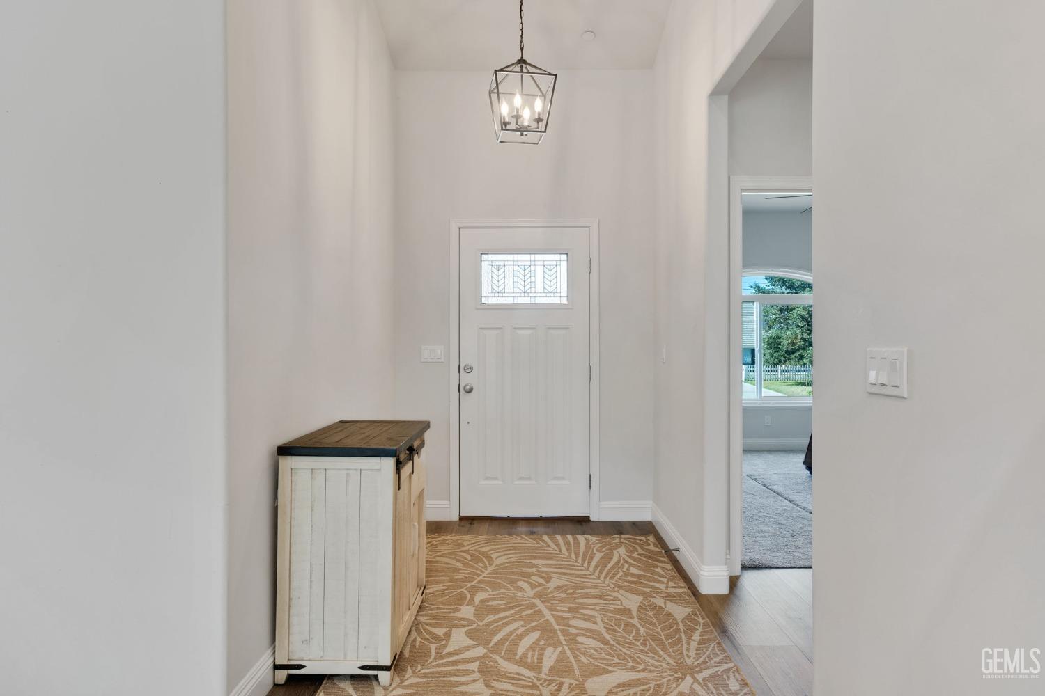 Undisclosed Address Tehachapi, CA 93561 - Photo 21 of 41 a view of an entryway with wooden floor