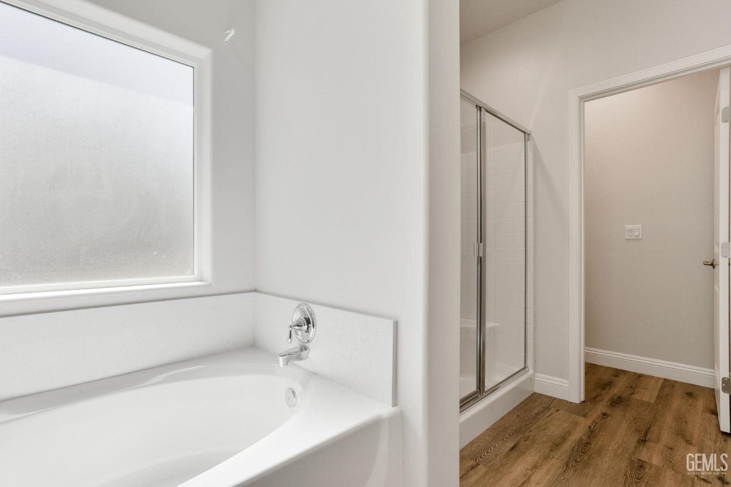 Undisclosed Address Tehachapi, CA 93561 - Photo 26 of 41 a bathroom with a bathtub and a shower