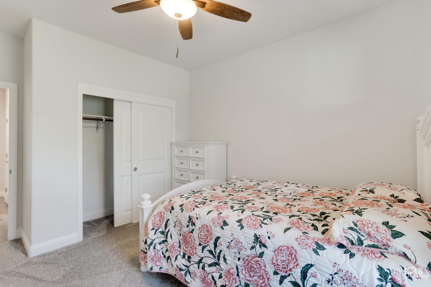 Undisclosed Address Tehachapi, CA 93561 - Photo 31 of 41 a bedroom with a bed and a dresser