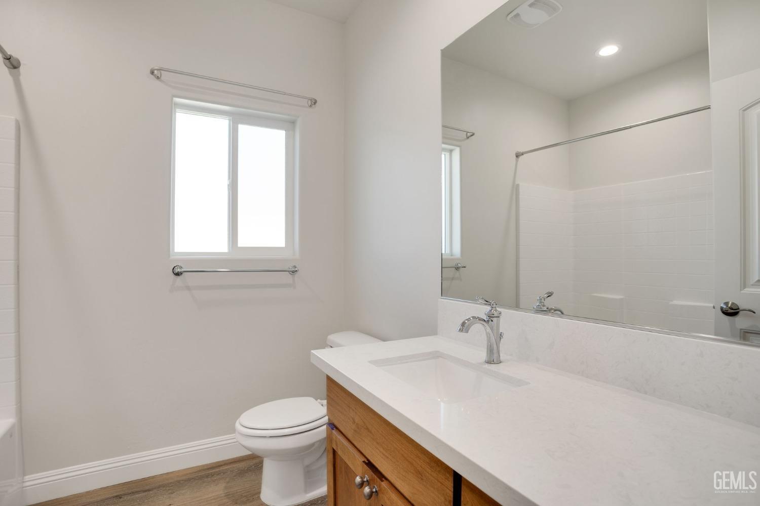 Undisclosed Address Tehachapi, CA 93561 - Photo 32 of 41 a bathroom with a sink a toilet and shower