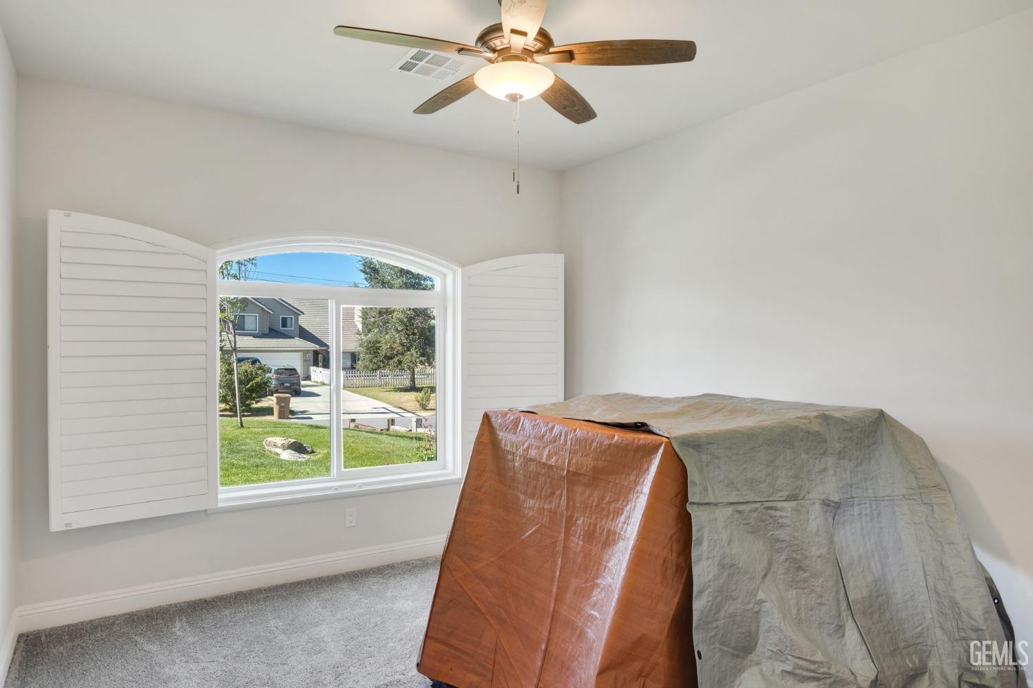 Undisclosed Address Tehachapi, CA 93561 - Photo 34 of 41 a bedroom with a bed and a window