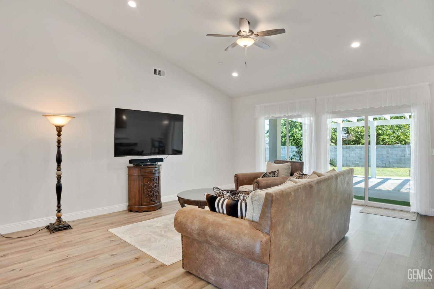 Undisclosed Address Tehachapi, CA 93561 - Photo 6 of 41 a living room with furniture and a flat screen tv