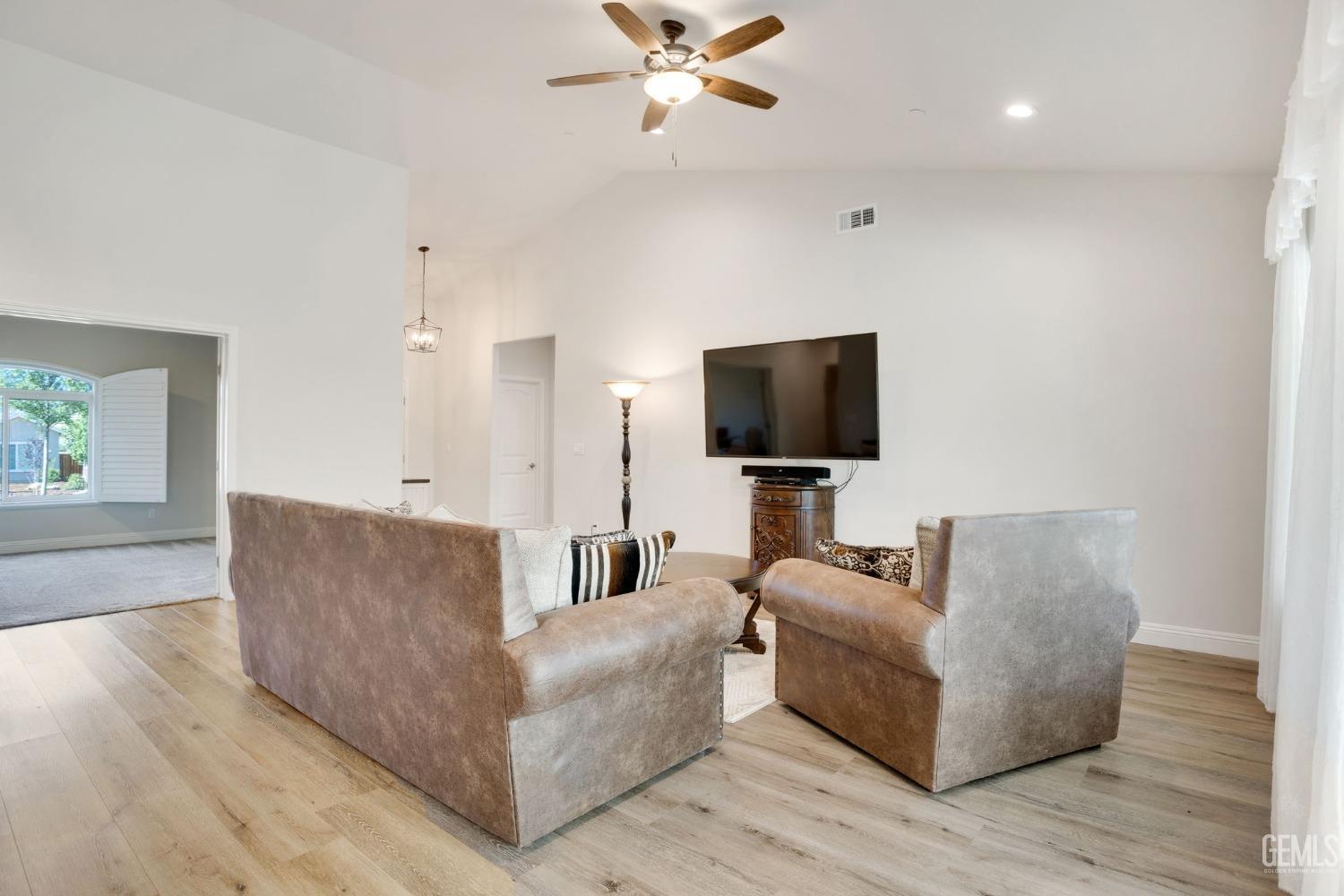 Undisclosed Address Tehachapi, CA 93561 - Photo 7 of 41 a living room with furniture and a flat screen tv