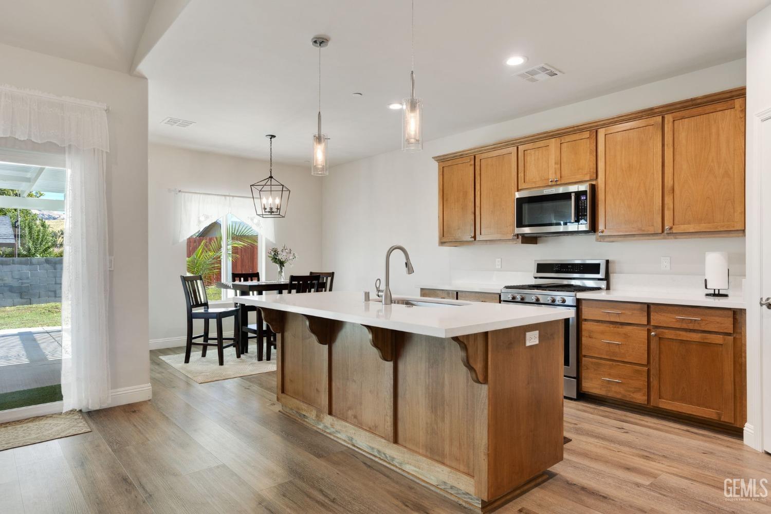 Undisclosed Address Tehachapi, CA 93561 - Photo 9 of 41 a kitchen with lots of counter top space and appliances