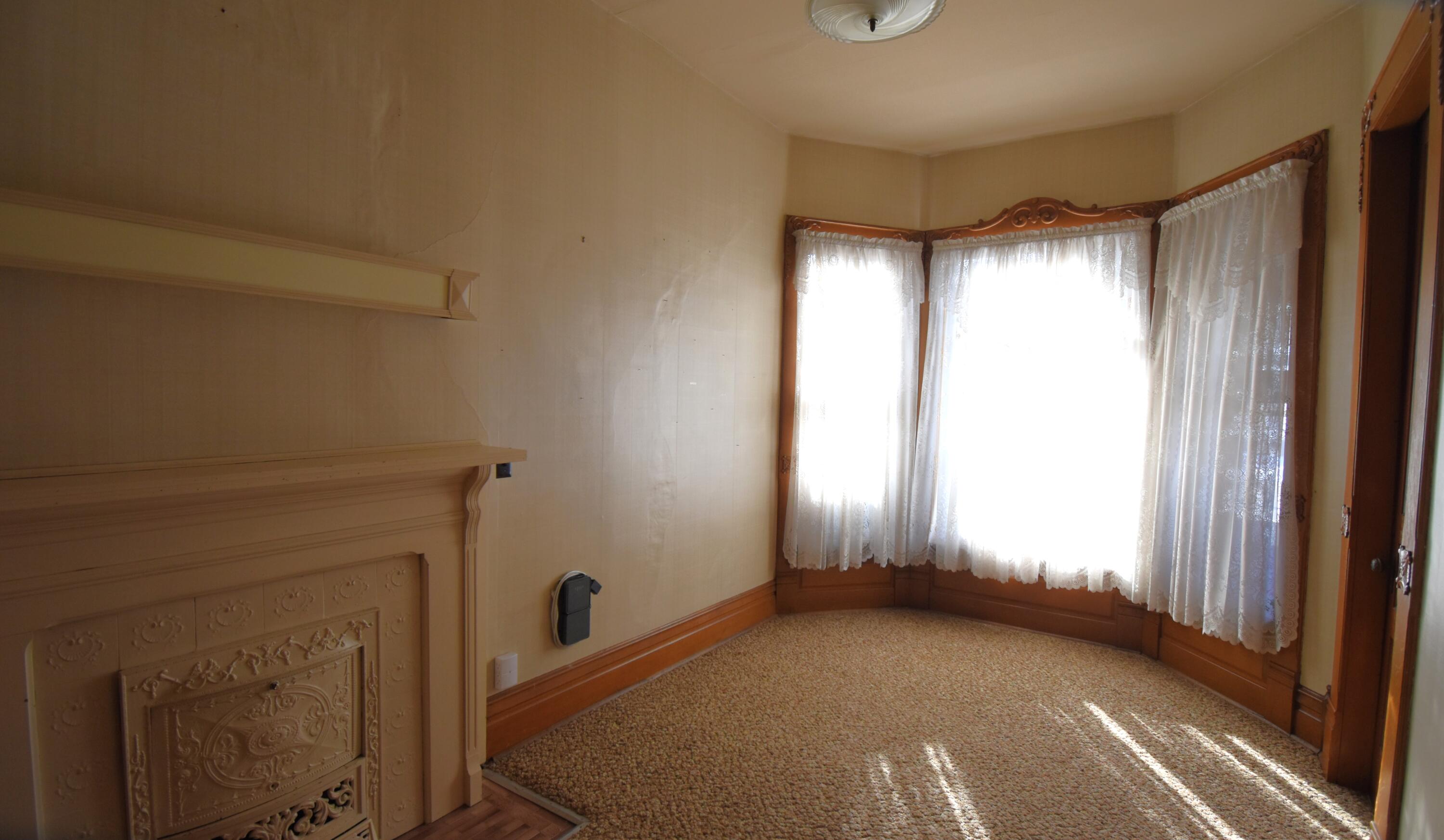 301 South Van Rensselaer Street Rensselaer, IN 47978 - Photo 12 of 42 a view of an empty room and window