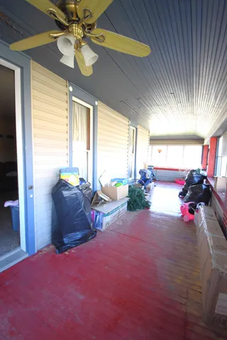 a kitchen with stainless steel appliances a stove a sink and a refrigerator