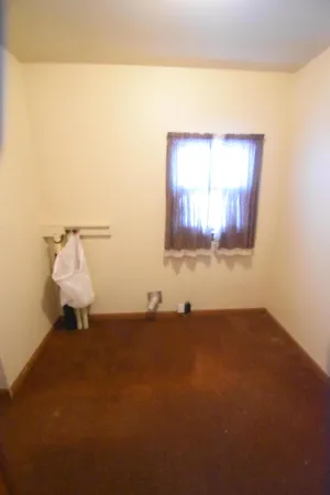 a view of a room with a window