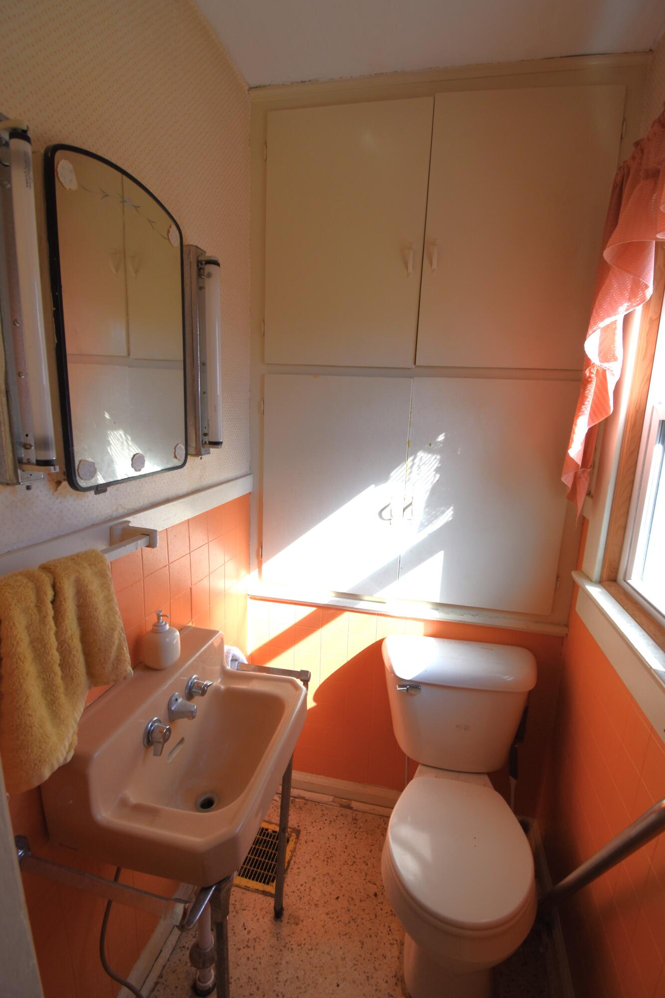301 South Van Rensselaer Street Rensselaer, IN 47978 - Photo 28 of 42 a bathroom with a toilet sink and mirror