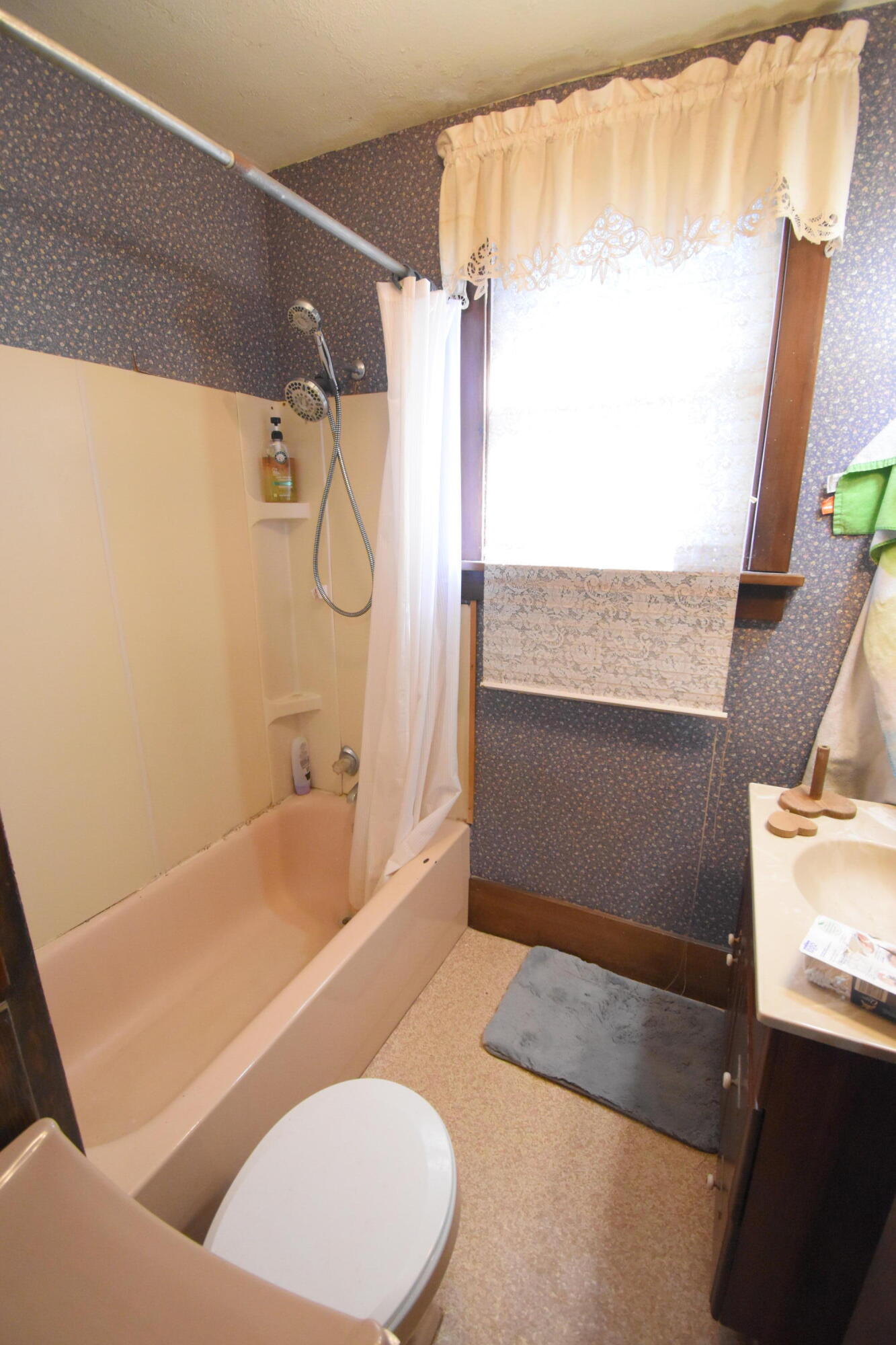 301 South Van Rensselaer Street Rensselaer, IN 47978 - Photo 36 of 42 a bathroom with a bathtub and a shower