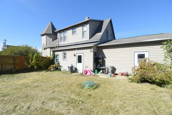 a front view of house with yard