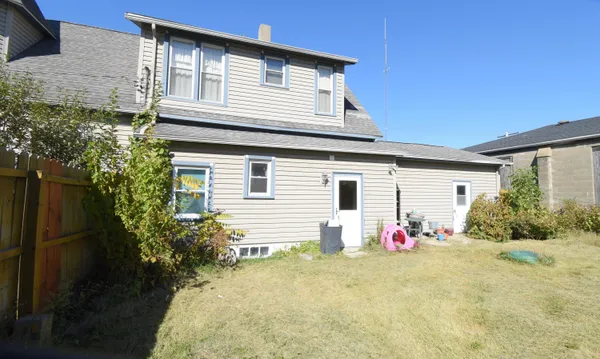 a front view of house with yard