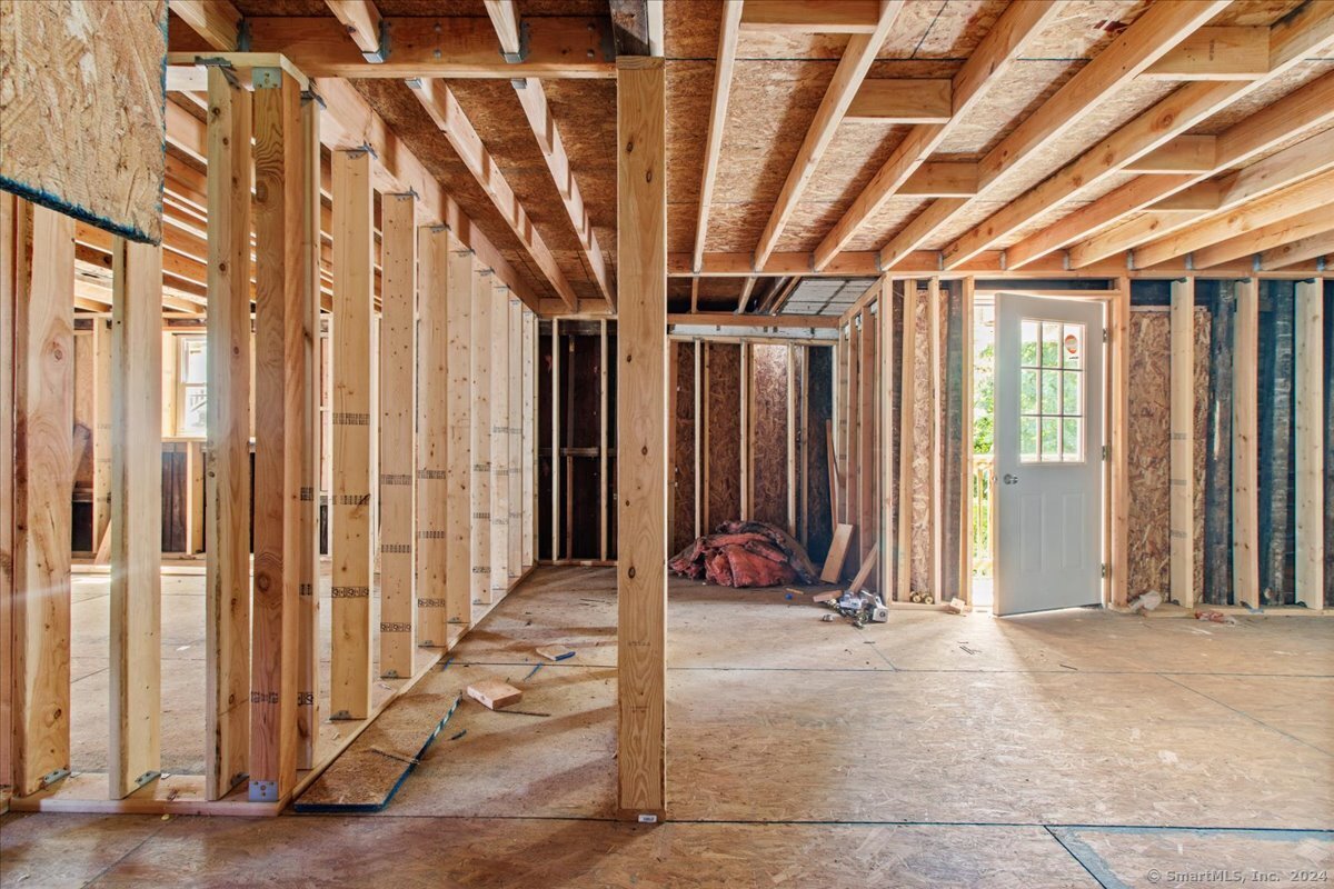 220 Franklin Street Norwich, CT 06360 - Photo 19 of 21 a view of a room with floor to ceiling windows and couch