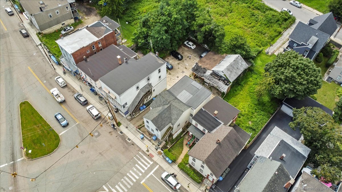 220 Franklin Street Norwich, CT 06360 - Photo 4 of 21 an aerial view of a house with a yard