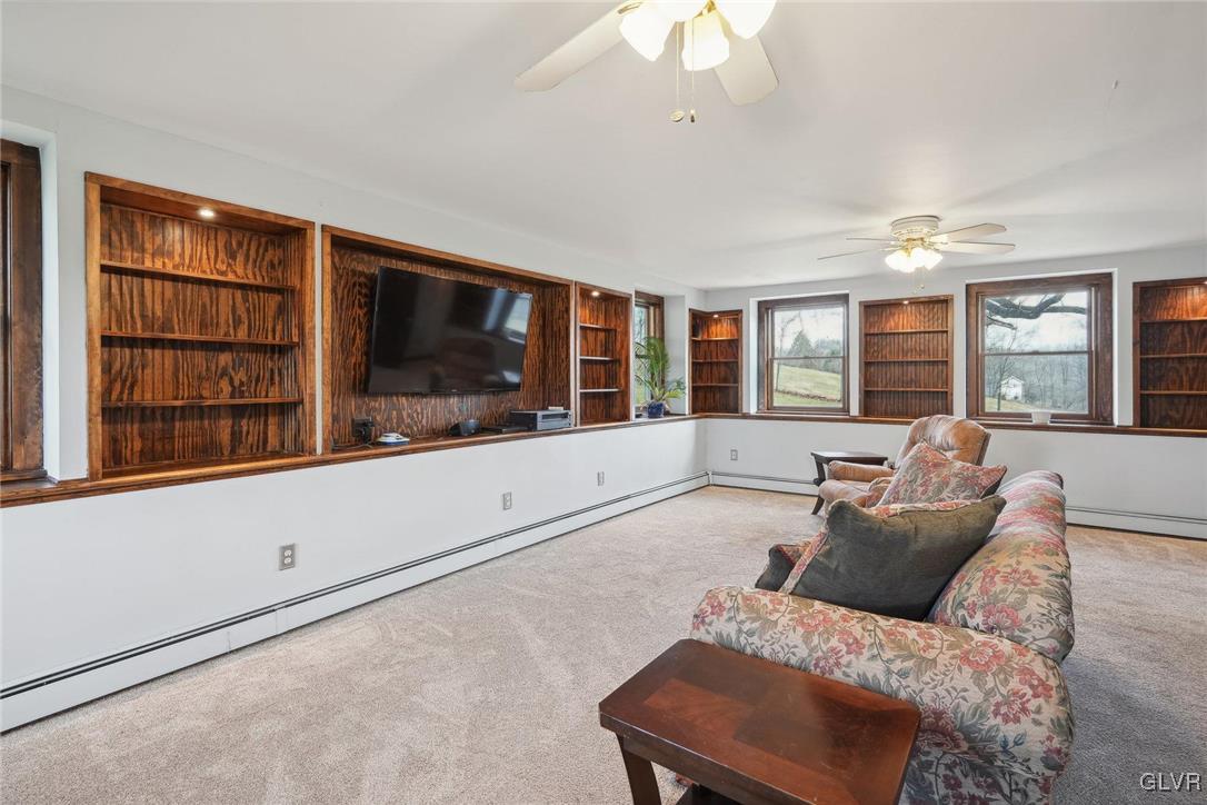 2426 Keeler Road Bath, PA 18014 - Photo 12 of 40 a living room with furniture window and flat screen tv