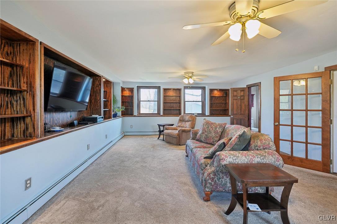 2426 Keeler Road Bath, PA 18014 - Photo 13 of 40 a living room with furniture and a flat screen tv