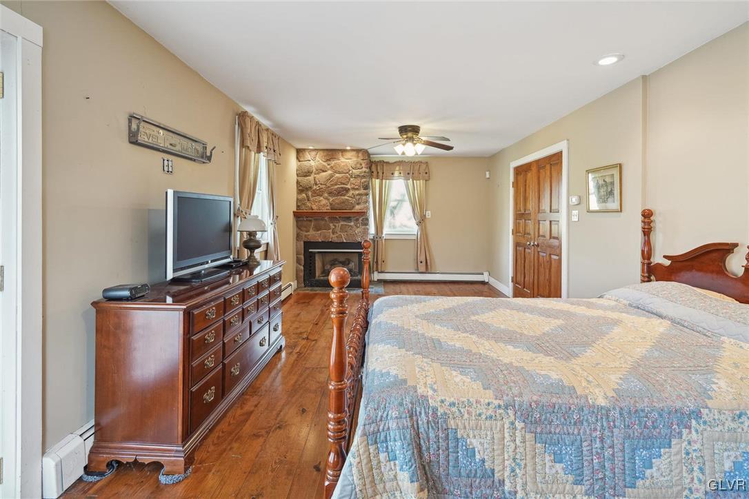 2426 Keeler Road Bath, PA 18014 - Photo 21 of 40 a bedroom with furniture and a flat screen tv