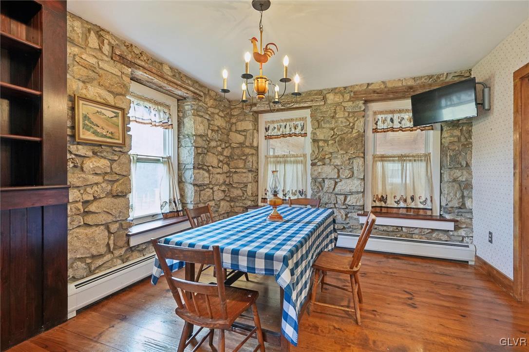 2426 Keeler Road Bath, PA 18014 - Photo 4 of 40 a dining room with furniture wooden floor and chandelier