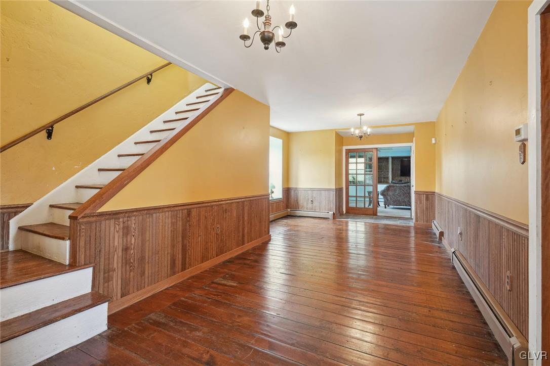 2426 Keeler Road Bath, PA 18014 - Photo 8 of 40 a view of a hallway with wooden floor and staircase