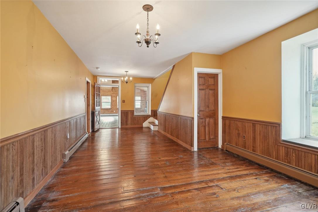 2426 Keeler Road Bath, PA 18014 - Photo 9 of 40 a view of a livingroom with wooden floor and stairs