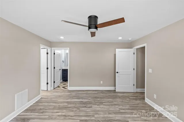 a view of a livingroom with wooden floor