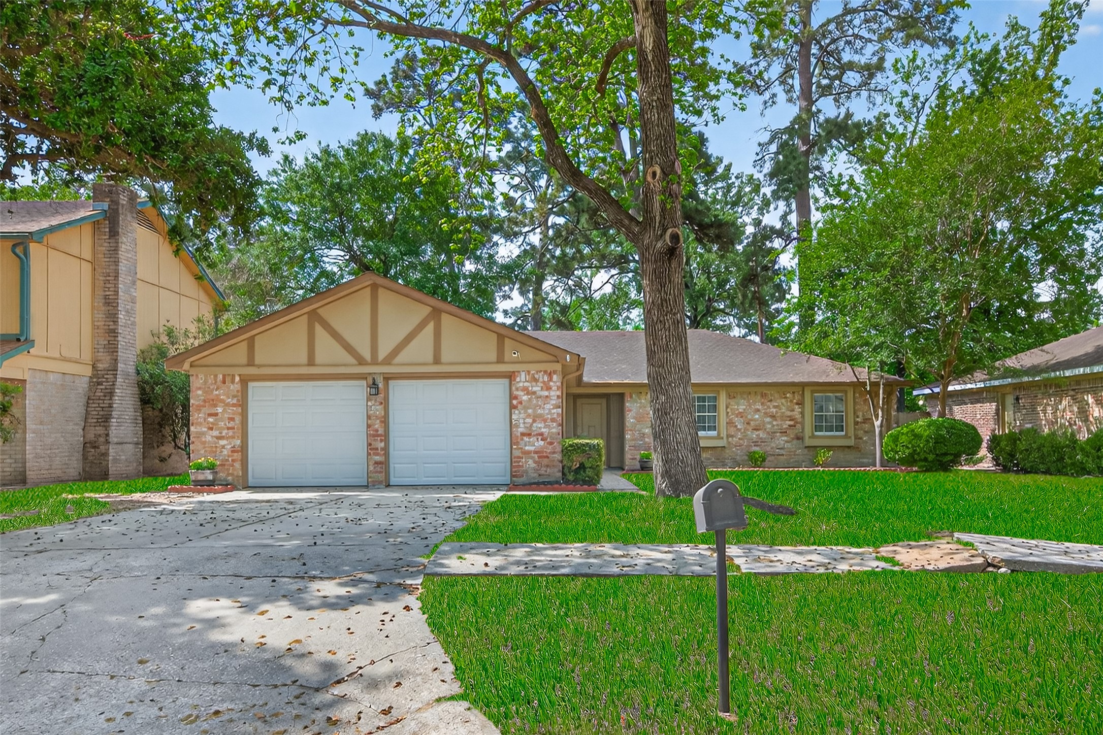 23919 Farm Hill Drive Spring, TX 77373 - Photo 3 of 41 a front view of house with yard and green space