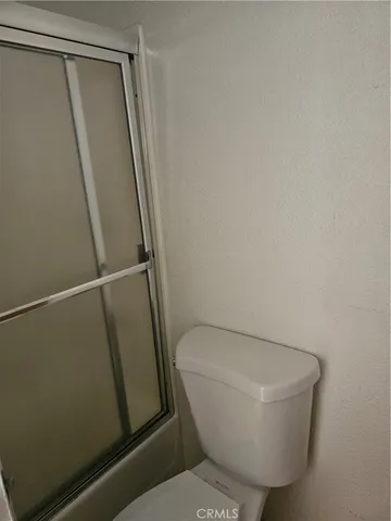 a bathroom with a sink and toilet