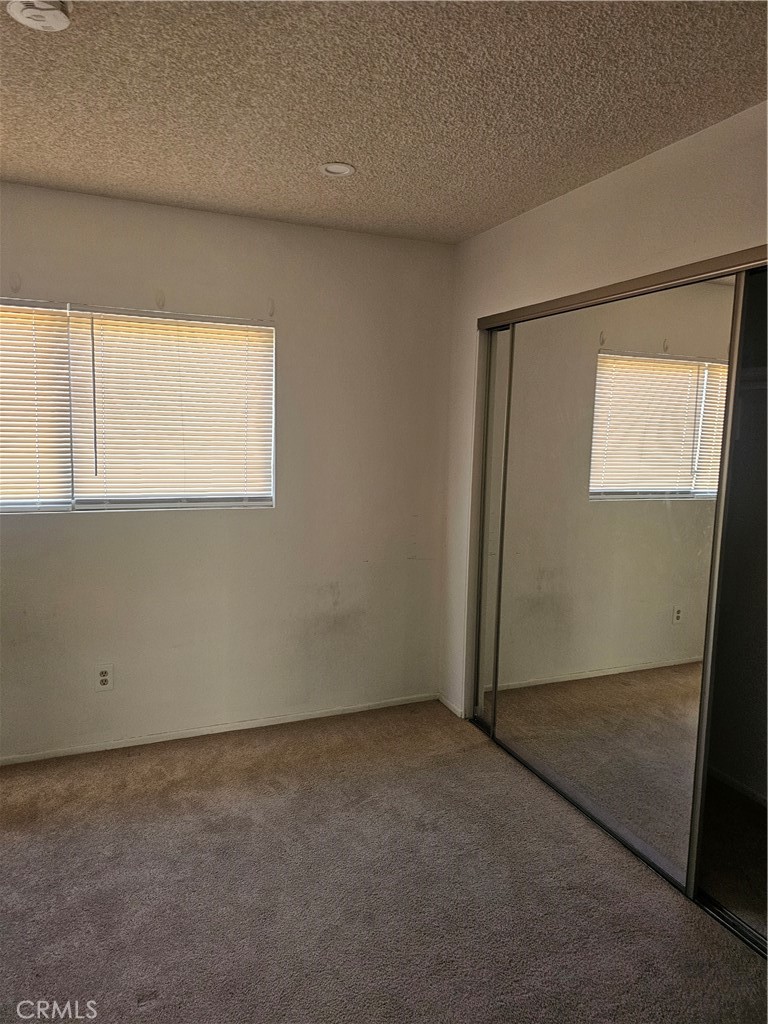 438 East Ave Q7, Unit B Palmdale, CA 93550 - Photo 19 of 26 an empty room with windows