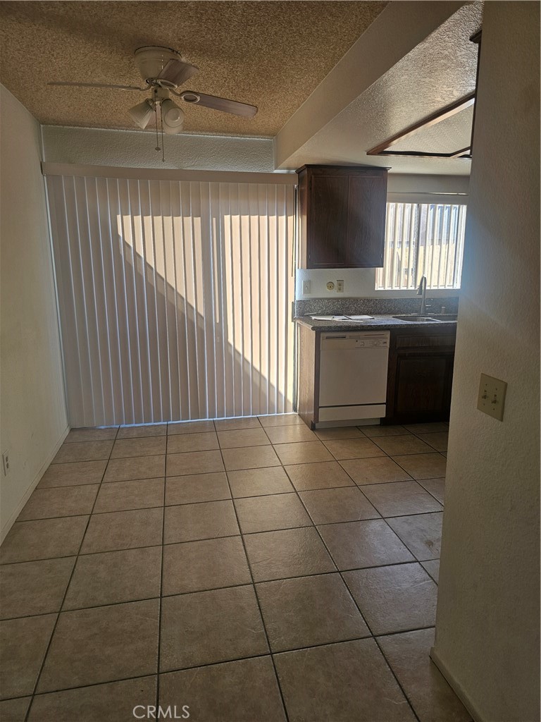 438 East Ave Q7, Unit B Palmdale, CA 93550 - Photo 23 of 26 a view of an empty room with a window